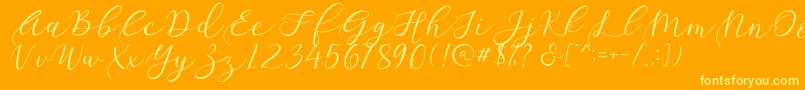 Sathyn Font – Yellow Fonts on Orange Background