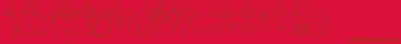 Fonte SatriyaMayaHandwriting – fontes marrons em um fundo vermelho
