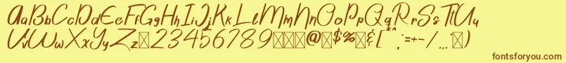 フォントSattori Demo – 茶色の文字が黄色の背景にあります。