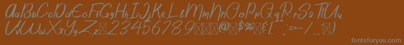 Шрифт Sattori Demo – серые шрифты на коричневом фоне