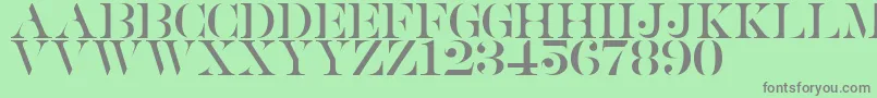 Fonte Saturdate Serif – fontes cinzas em um fundo verde