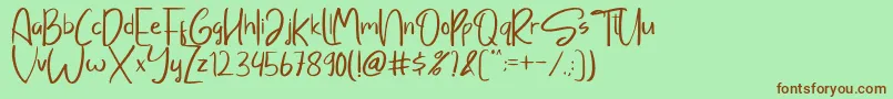 Sayangable Font – Brown Fonts on Green Background