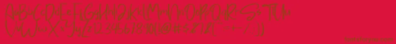 Sayangable-Schriftart – Braune Schriften auf rotem Hintergrund