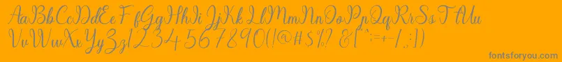 Sayidah-Schriftart – Graue Schriften auf orangefarbenem Hintergrund