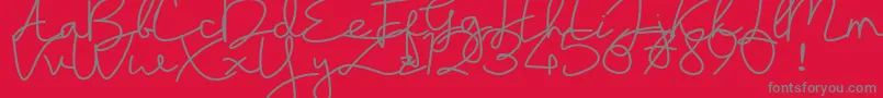 フォントsayyidati demo – 赤い背景に灰色の文字