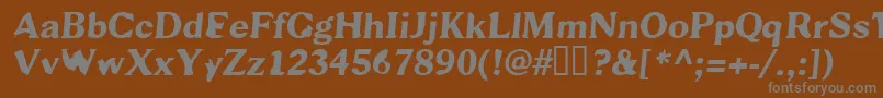 Scab-fontti – harmaat kirjasimet ruskealla taustalla