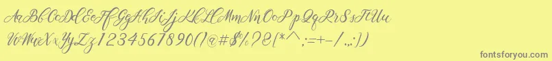 フォントScallion – 黄色の背景に灰色の文字