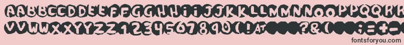 フォントscandal – ピンクの背景に黒い文字