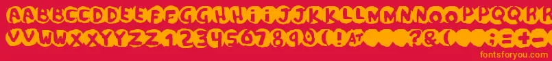 フォントscandal – 赤い背景にオレンジの文字