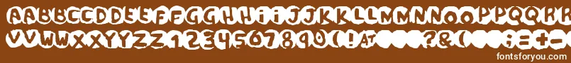 フォントscandal – 茶色の背景に白い文字