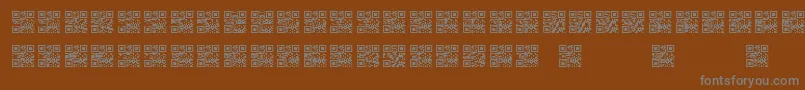 Scanme   QR   BC-fontti – harmaat kirjasimet ruskealla taustalla