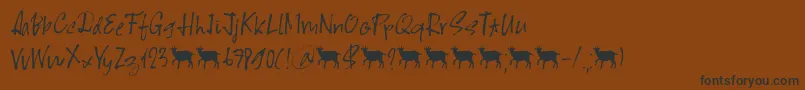 Scapegoat DEMO-Schriftart – Schwarze Schriften auf braunem Hintergrund