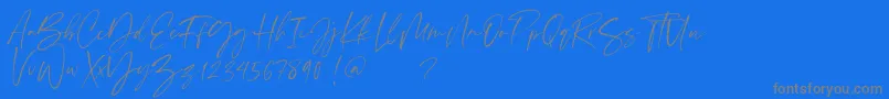 Scatter ink-Schriftart – Graue Schriften auf blauem Hintergrund