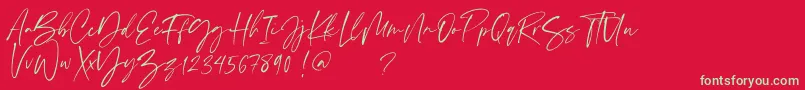 Scatter ink-Schriftart – Grüne Schriften auf rotem Hintergrund