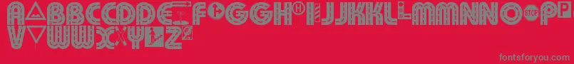 フォントSchilderwald alt – 赤い背景に灰色の文字