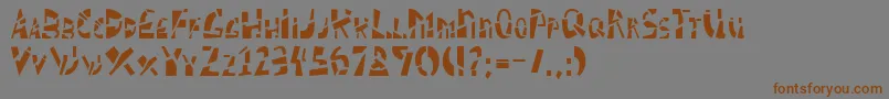 フォントSCHIZM   – 茶色の文字が灰色の背景にあります。