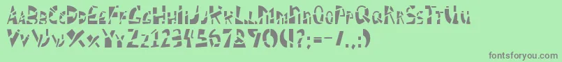 SCHIZM  -Schriftart – Graue Schriften auf grünem Hintergrund