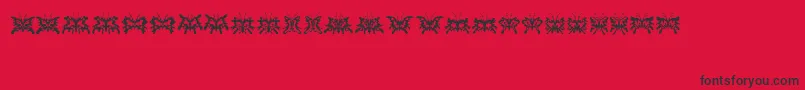 フォントSchmetterlinge – 赤い背景に黒い文字