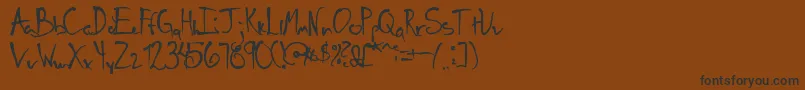 フォントschneller – 黒い文字が茶色の背景にあります