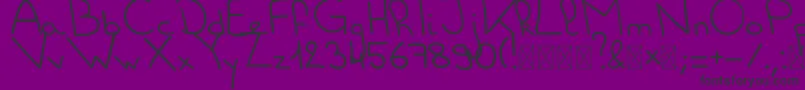 フォントScholar – 紫の背景に黒い文字