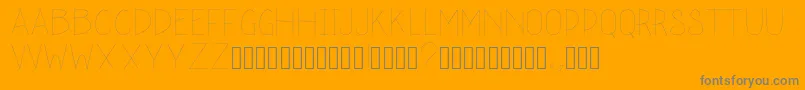 Czcionka schoolah thin – szare czcionki na pomarańczowym tle