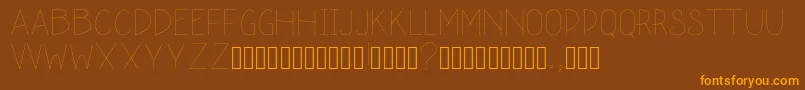 schoolah thin-Schriftart – Orangefarbene Schriften auf braunem Hintergrund
