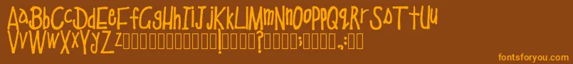 SchoolEducation Regular Font – Orange Fonts on Brown Background