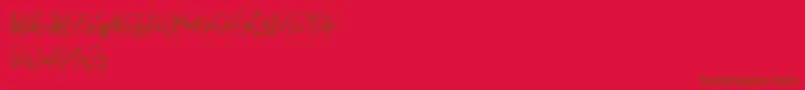 Więcej informacji o czcionce Schrader Czcionka Schrader – brązowe czcionki na czerwonym tle