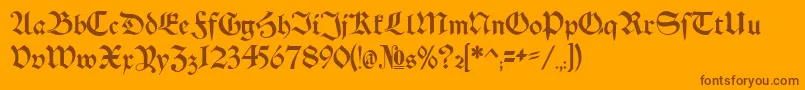 Schwaben Alt Bold-Schriftart – Braune Schriften auf orangefarbenem Hintergrund