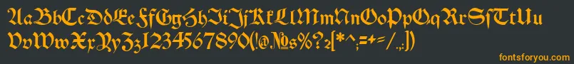 フォントSchwaben Alt Bold – 黒い背景にオレンジの文字