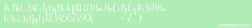 フォントScooter Free – 緑の背景に白い文字