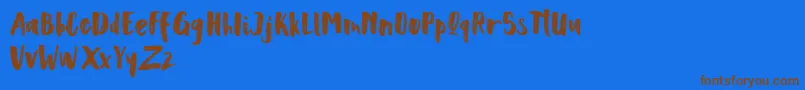 Scoothlane Sans Brush Font – Brown Fonts on Blue Background