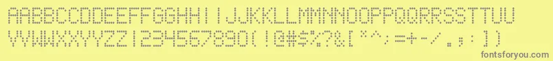scoreboard-fontti – harmaat kirjasimet keltaisella taustalla