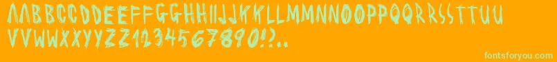 SCRAWL  -Schriftart – Grüne Schriften auf orangefarbenem Hintergrund