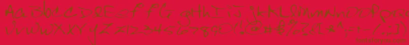 Scrawl-Schriftart – Braune Schriften auf rotem Hintergrund