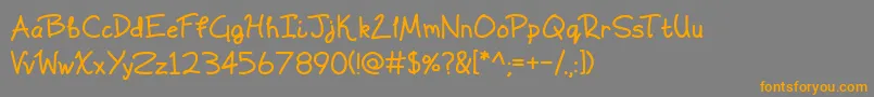 Scrawling Pad Font – Orange Fonts on Gray Background