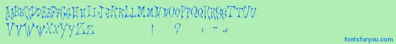 Czcionka Scrawlings – niebieskie czcionki na zielonym tle