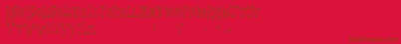 Scrawlings Font – Brown Fonts on Red Background