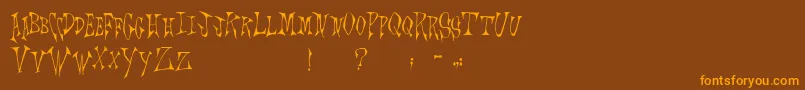 Scrawlings Font – Orange Fonts on Brown Background
