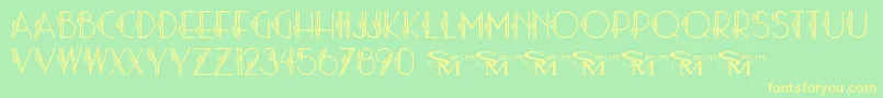 Stardust06 Font – Yellow Fonts on Green Background