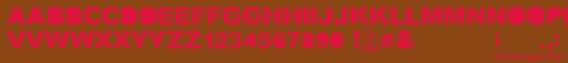 Screwdriver Font – Red Fonts on Brown Background
