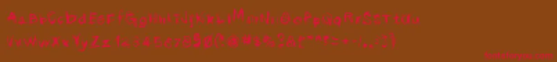 scribblicious-Schriftart – Rote Schriften auf braunem Hintergrund