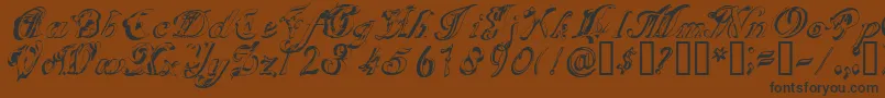 フォントSCRIG    – 黒い文字が茶色の背景にあります