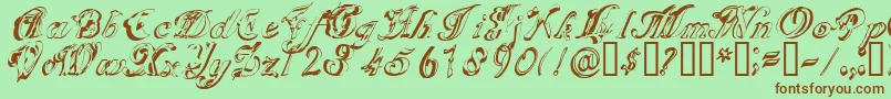 Fonte SCRIG    – fontes marrons em um fundo verde