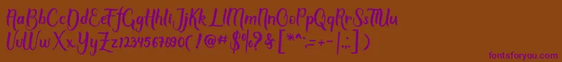 Script Mothers-fontti – violetit fontit ruskealla taustalla