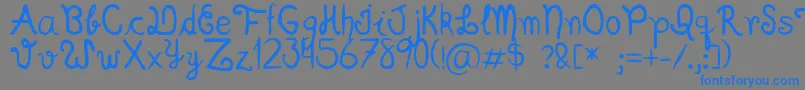 フォントScriptia Happy – 灰色の背景に青い文字