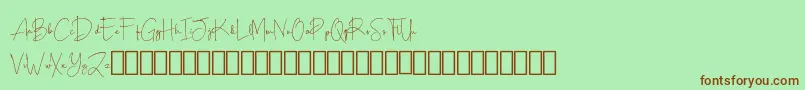 Шрифт Scripty Demo – коричневые шрифты на зелёном фоне