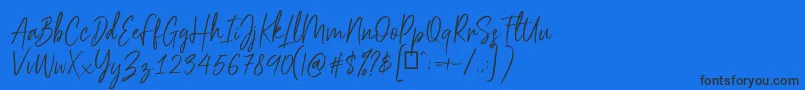 Scriptyca Font – Black Fonts on Blue Background