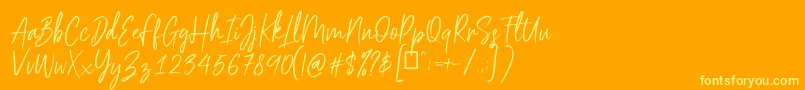 Scriptyca Font – Yellow Fonts on Orange Background