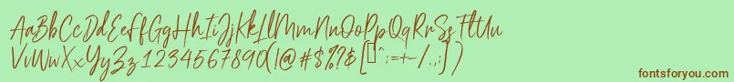 Шрифт Scriptyca – коричневые шрифты на зелёном фоне